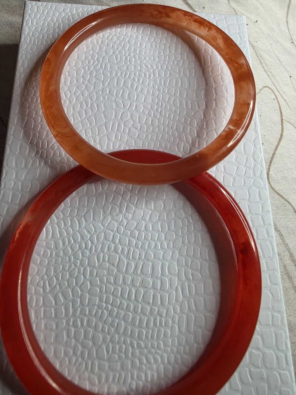 Set of Two Resin Bangle Bracelets in Amber and Red